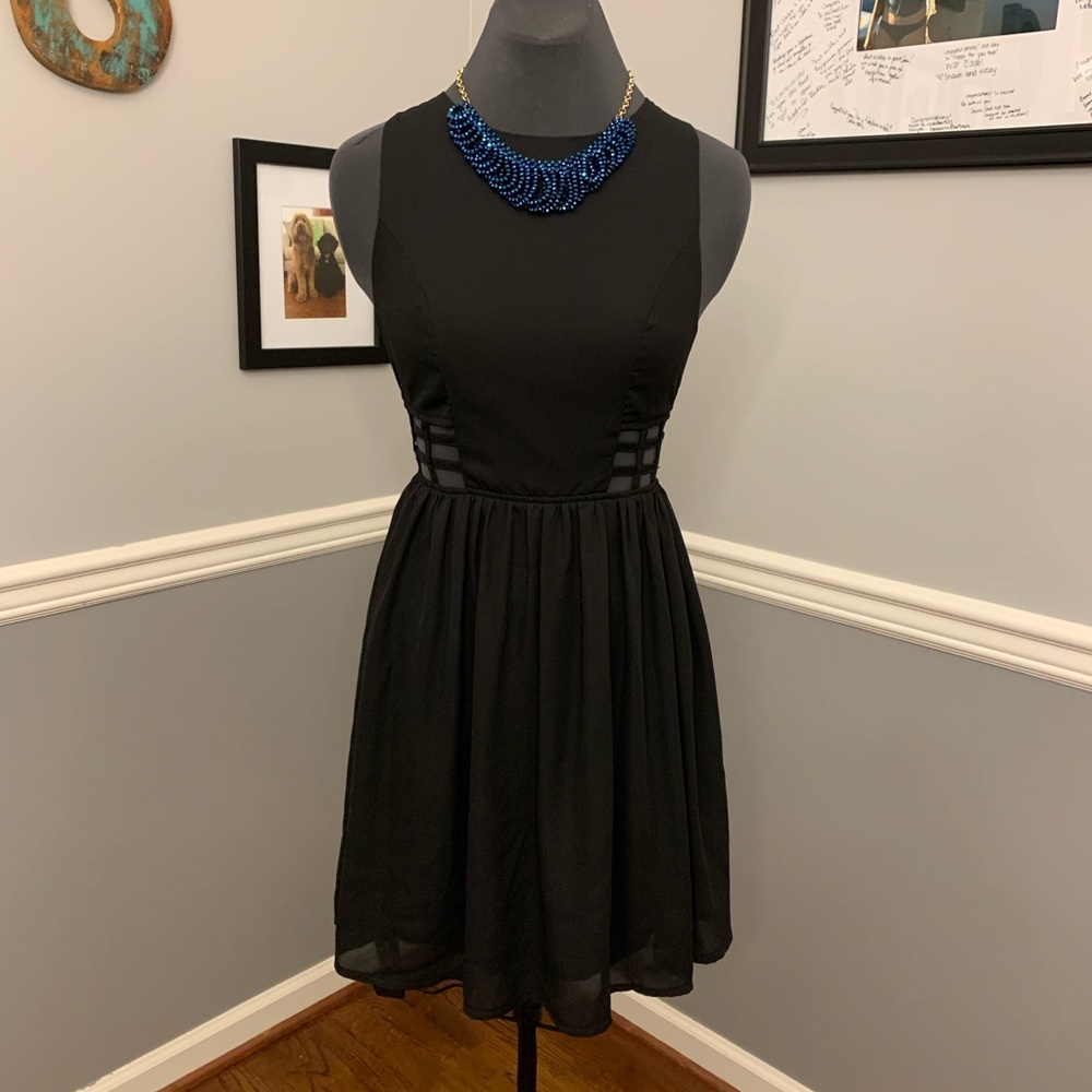 Short black dress with cutouts